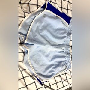 Light blue Nike running shorts